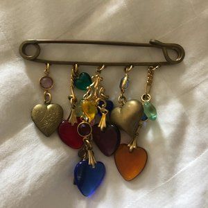 Pin with little charms